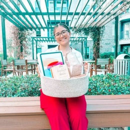 a woman holding a basket